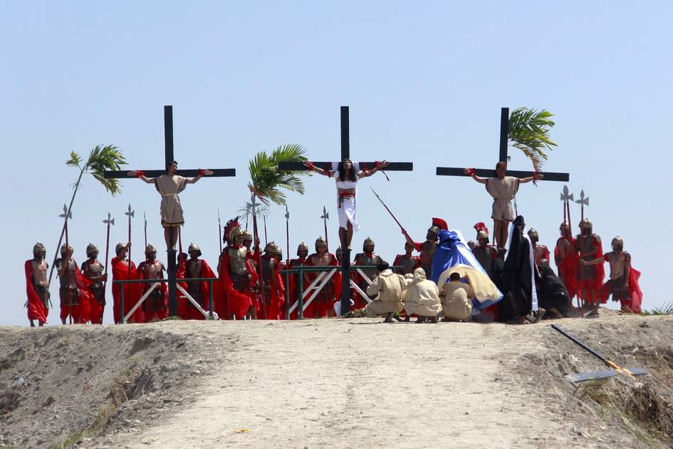 Penitents and actors in The Lenten Rites in Pampanga, Philippines. 