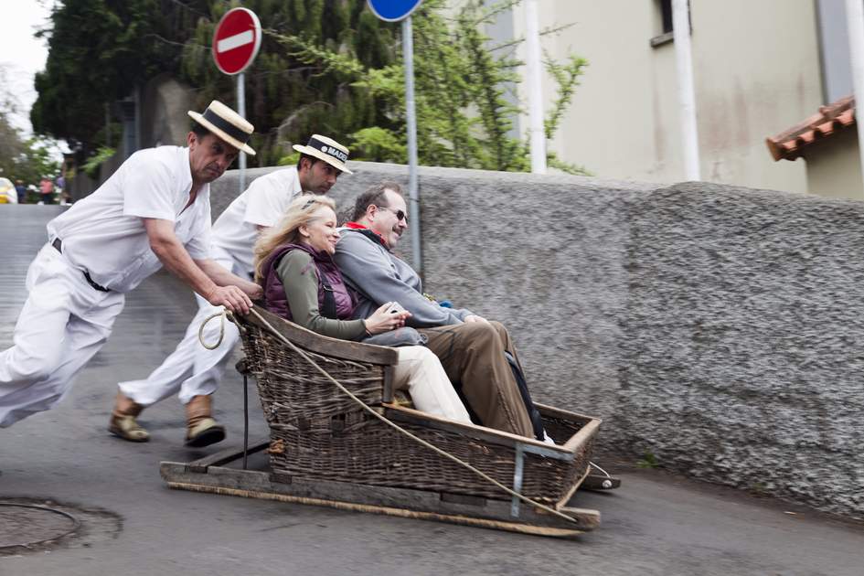 Traditional downhill sledge trip in Madeira, Portugal. 