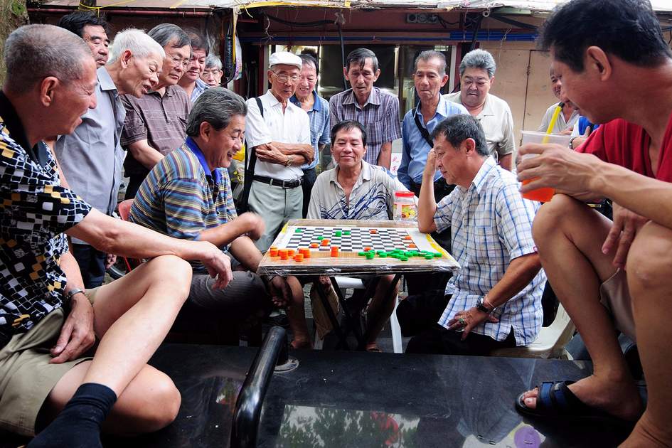 A chess game in Singapore's Chinatown A chess game in Singapore's Chinatown