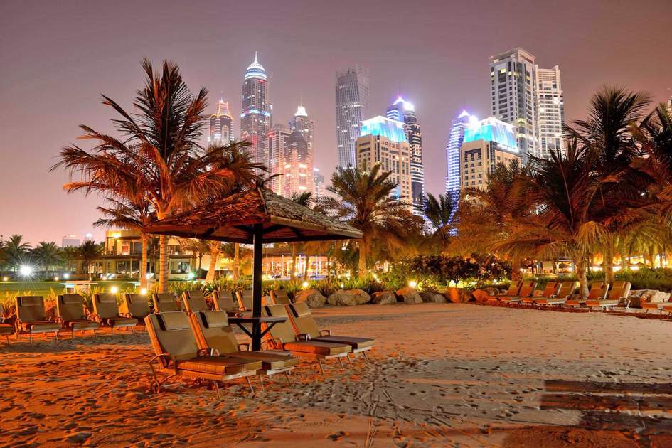 Beach night illumination of the luxury hotel, Dubai, UAE