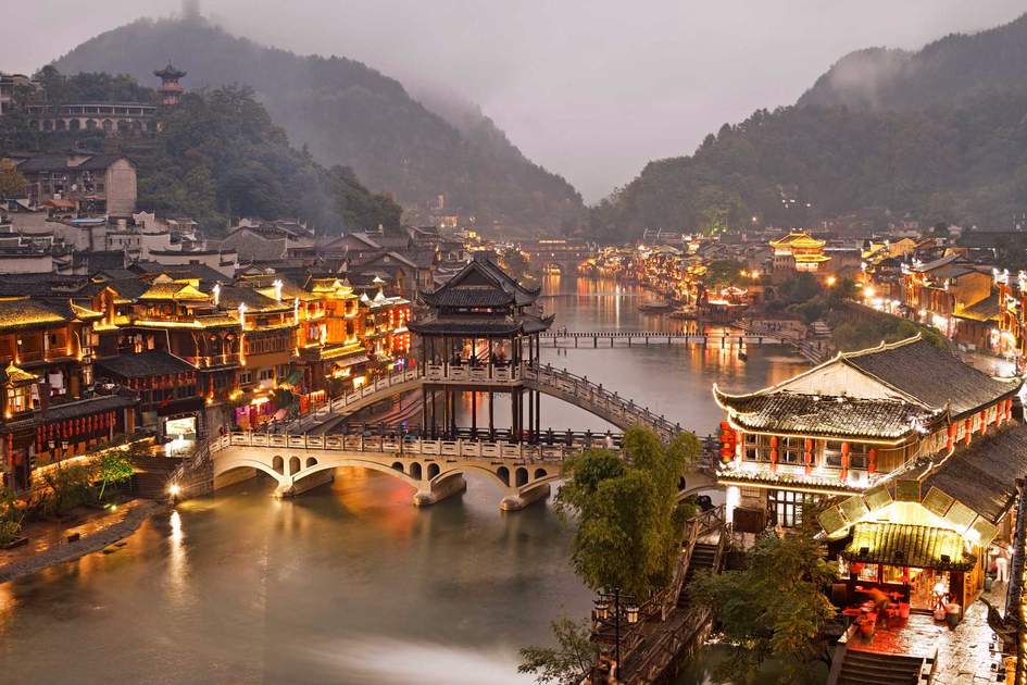 Fenghuang (Phoenix) ancient town at night, Hunan province, China.