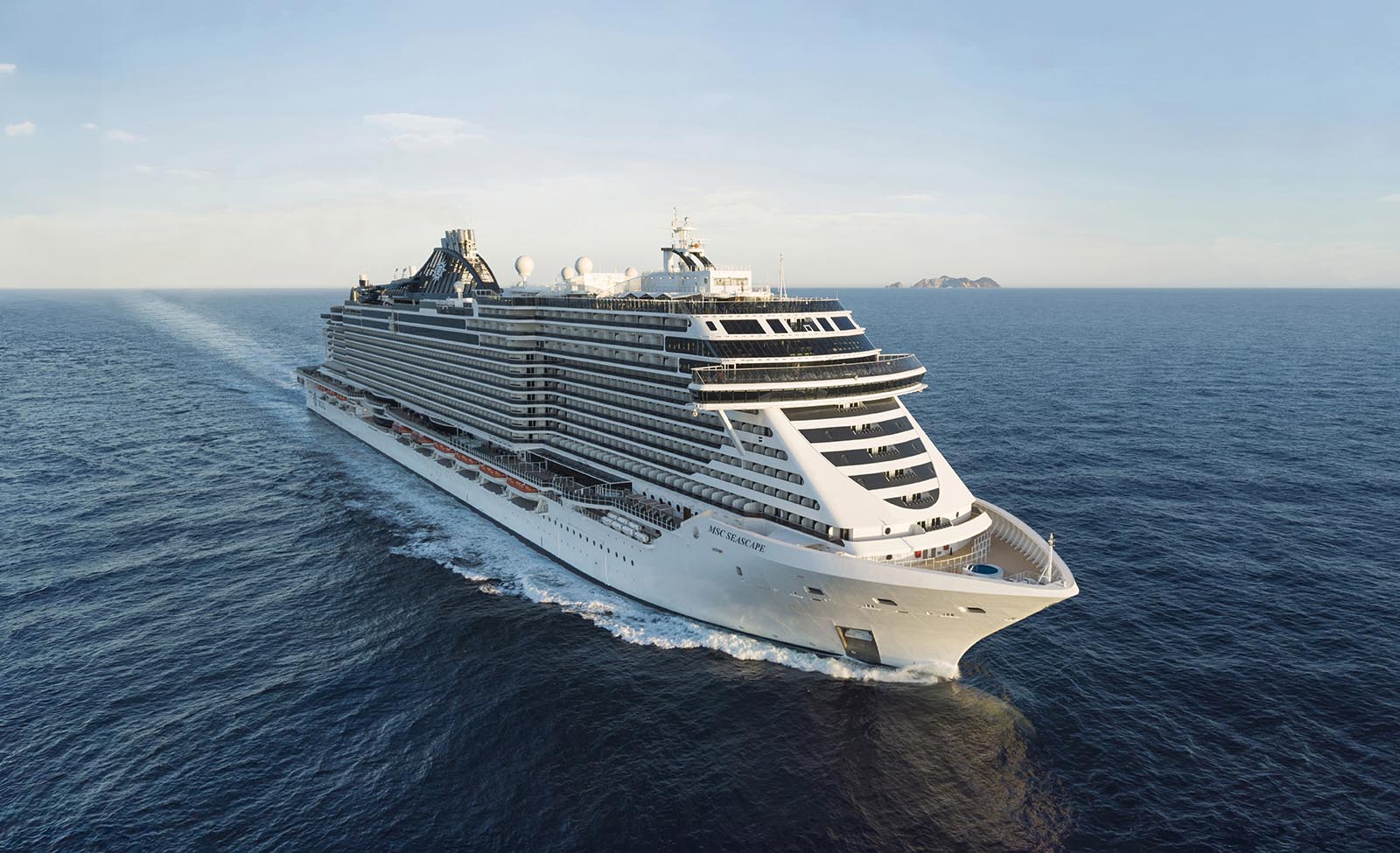 white cruise ship at sea